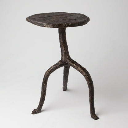 Wal Sticks Table by Global Views in antique bronze. Made from cast iron in a eclectic & global style.