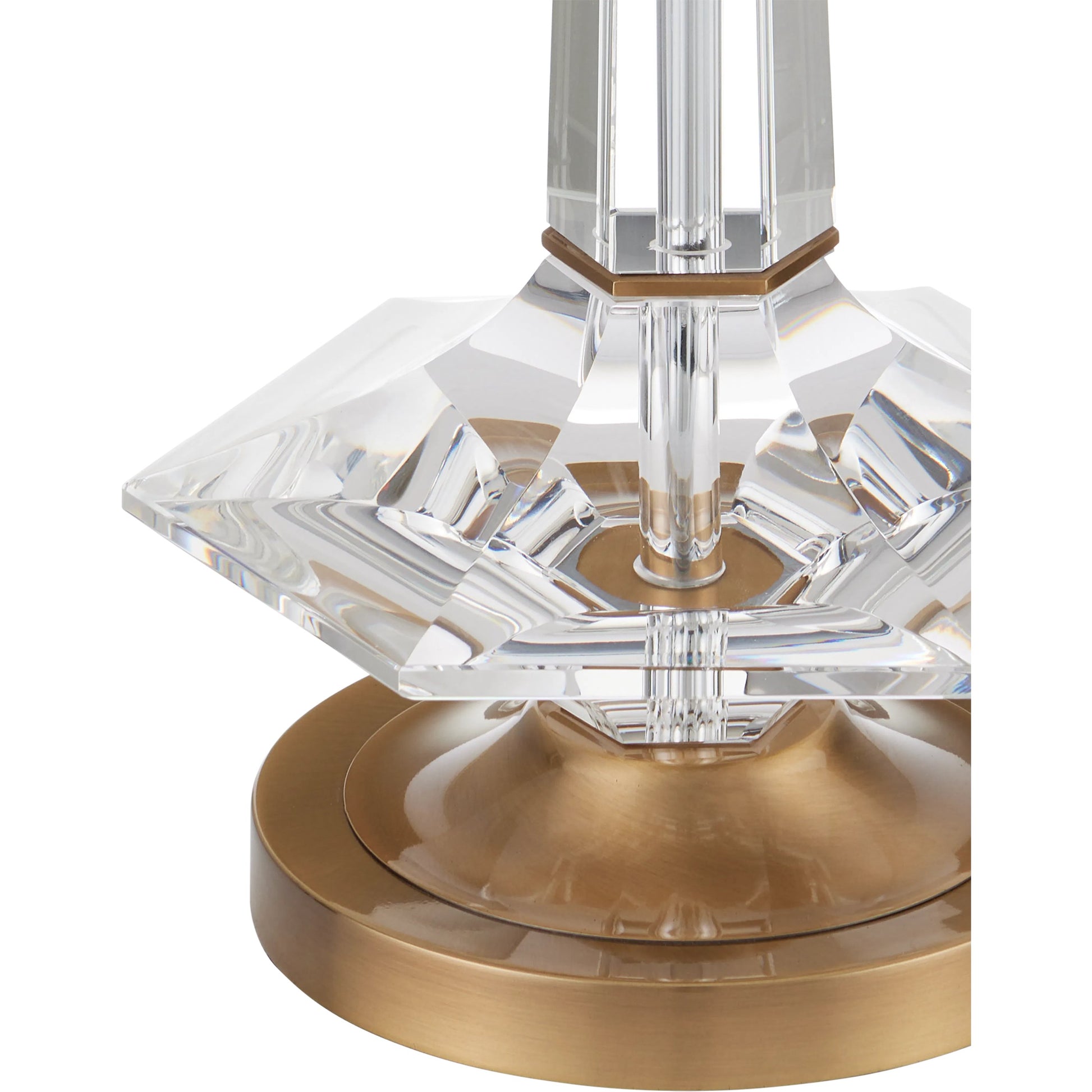 Anton Table Lamp by Currey and Company in clear, antique brass. Made from optic crystal, metal in a modern style.