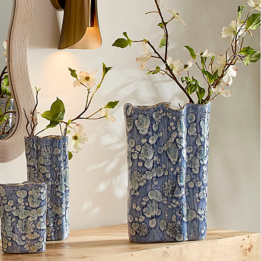 Cloud Vase by The Livingston Collection in blue and reactive blue glaze. Made from ceramic in a unique style.