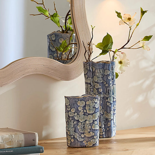 Cloud and Vase Set by The Livingston Collection in blue and reactive blue glaze. Made from ceramic in a unique style.