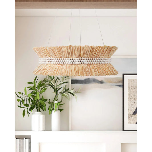 Seychelles Chandelier by Currey and Company in sugar white, natural raffia. Made from wrought iron, raffia, wood beads in a coastal style.