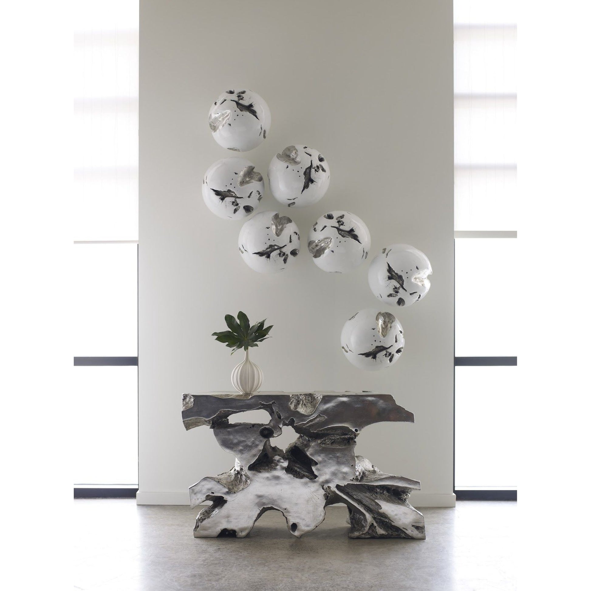 Cast Root Wall Ball by Phillips Collection in white, silver. Made from resin in a modern style.