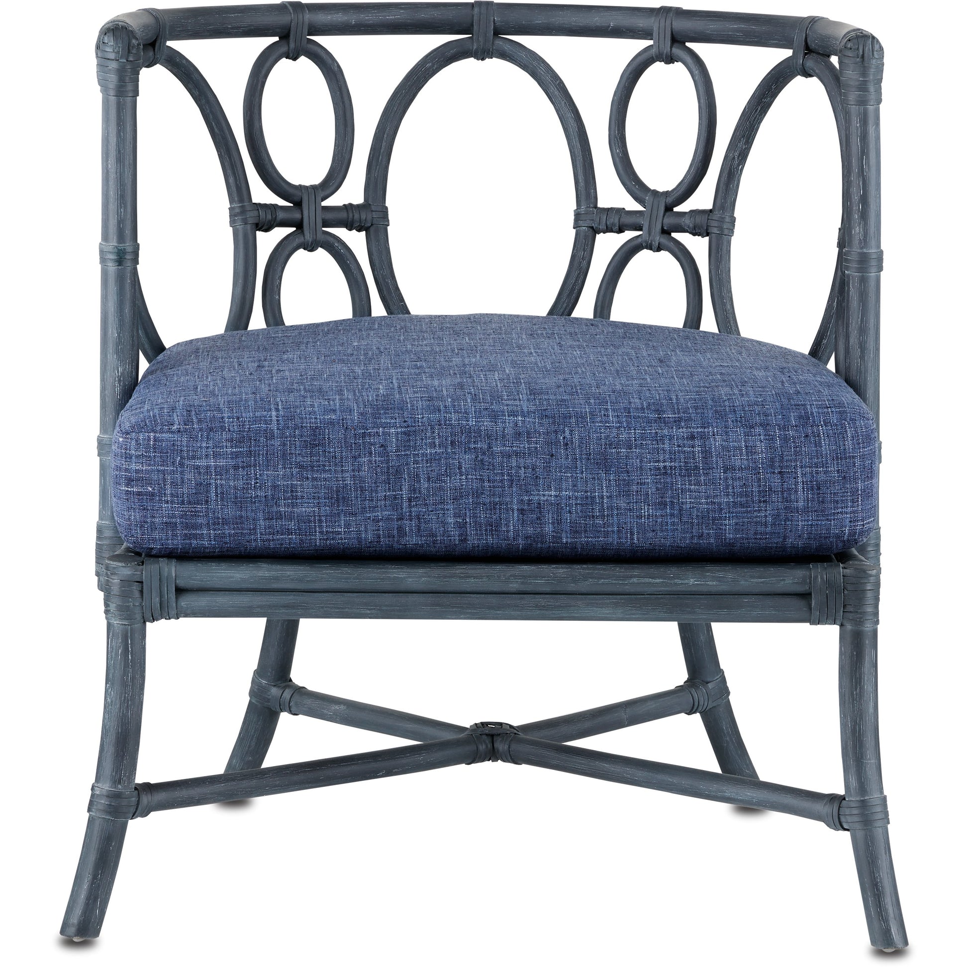 Tegal Chair by Currey and Company in vintage navy, indigo. Made from rattan, plywood, fabric, foam in a coastal style.