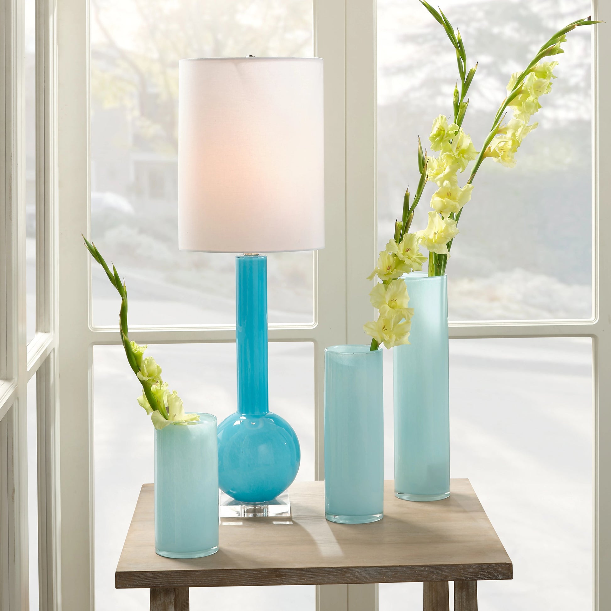 Gwendolyn Vases by Jamie Young. Made from glass in a modern style.