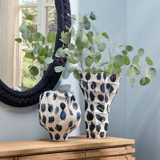 Monet Wide Vase by The Livingston Collection in blue and reactive blue glaze spotted. Made from ceramic in a unique style.