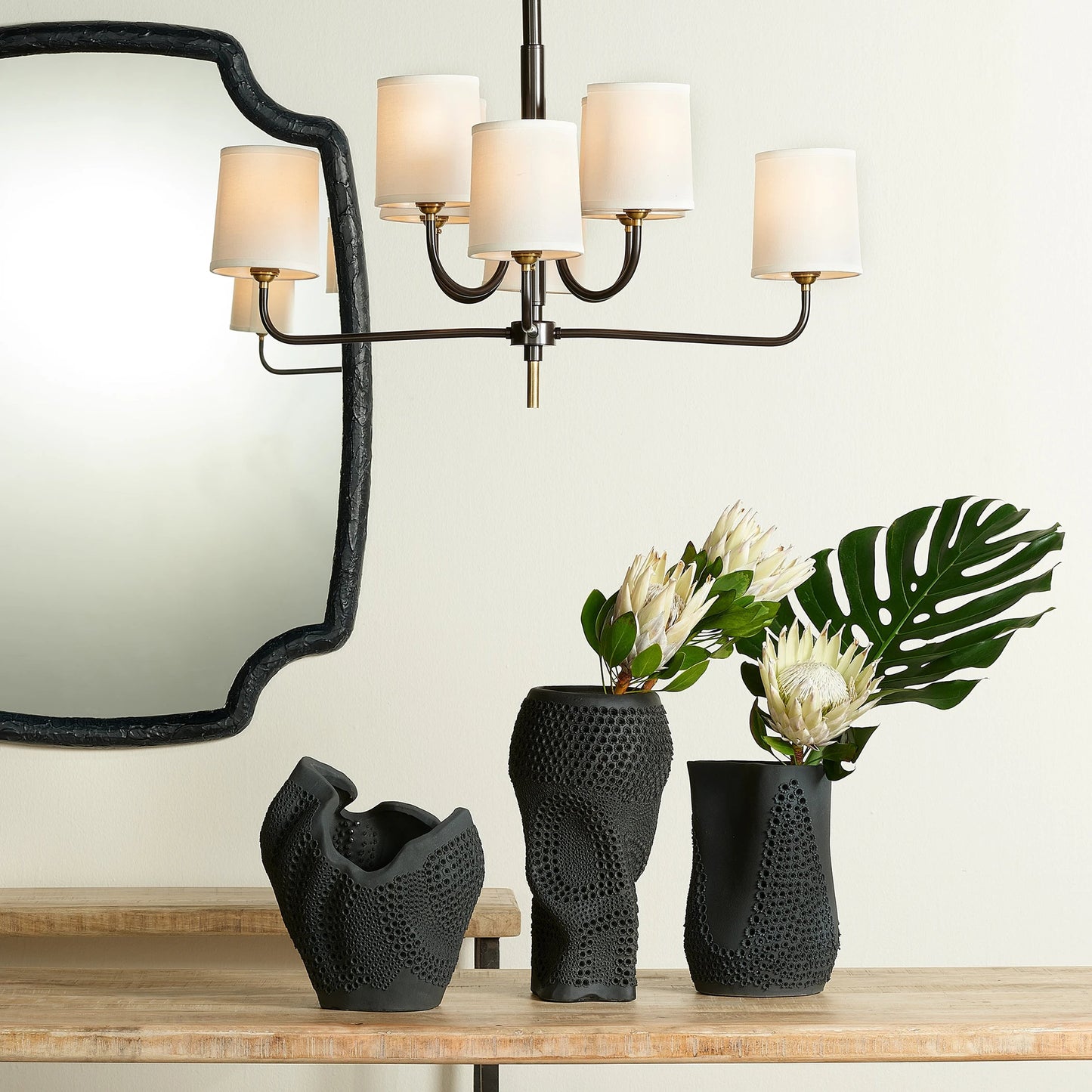 004 SI-1831457 | Lifestyle | Moonrise Vase by Jamie Young in matte black. Made from porcelain in a modern style.