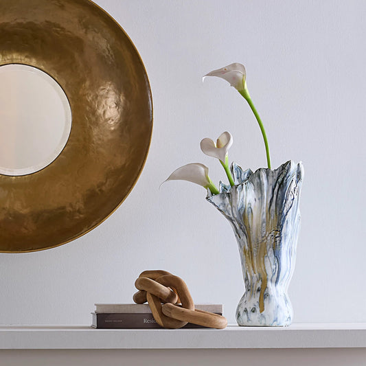 Orca Vase by The Livingston Collection in blue and reactive blue glaze. Made from ceramic in a unique style.