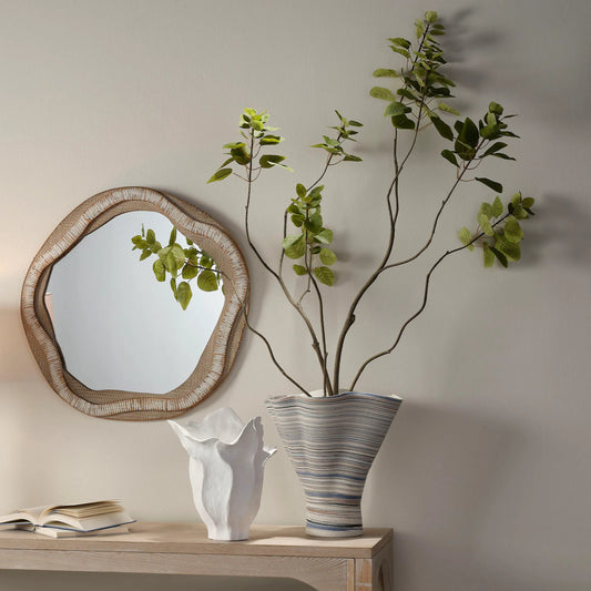 Splayed Vase by The Livingston Collection in blue and matte, textured white, blue. Made from porcelain in a unique style.