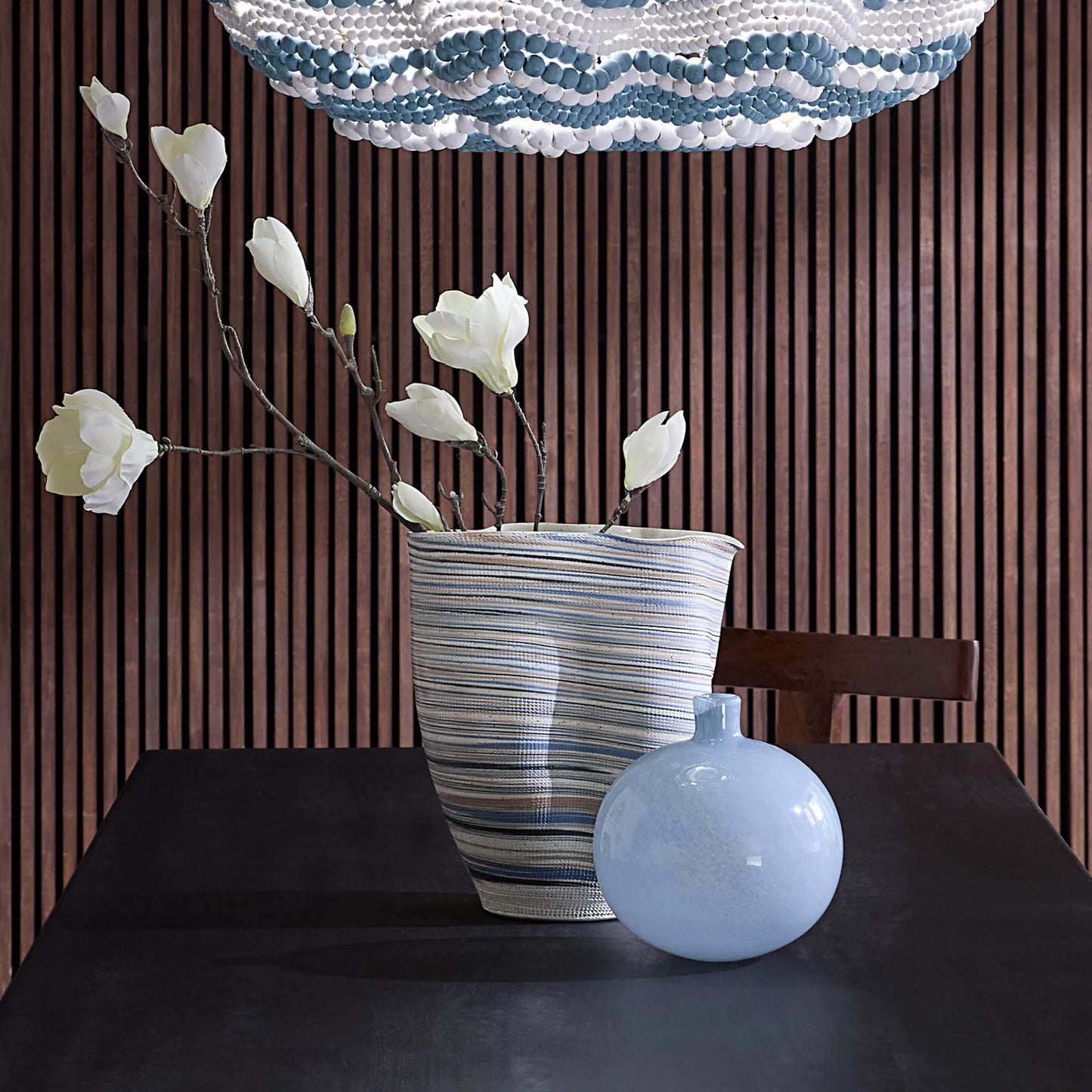 003 SI-2320422 | Lifestyle | Undulation Vase by Jamie Young in blue and matte, textured white, blue. Made from porcelain in a eclectic & global style.