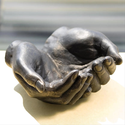 Hand Bowl by Global Views in antique statuary bronze. Made from iron in a eclectic & global style.