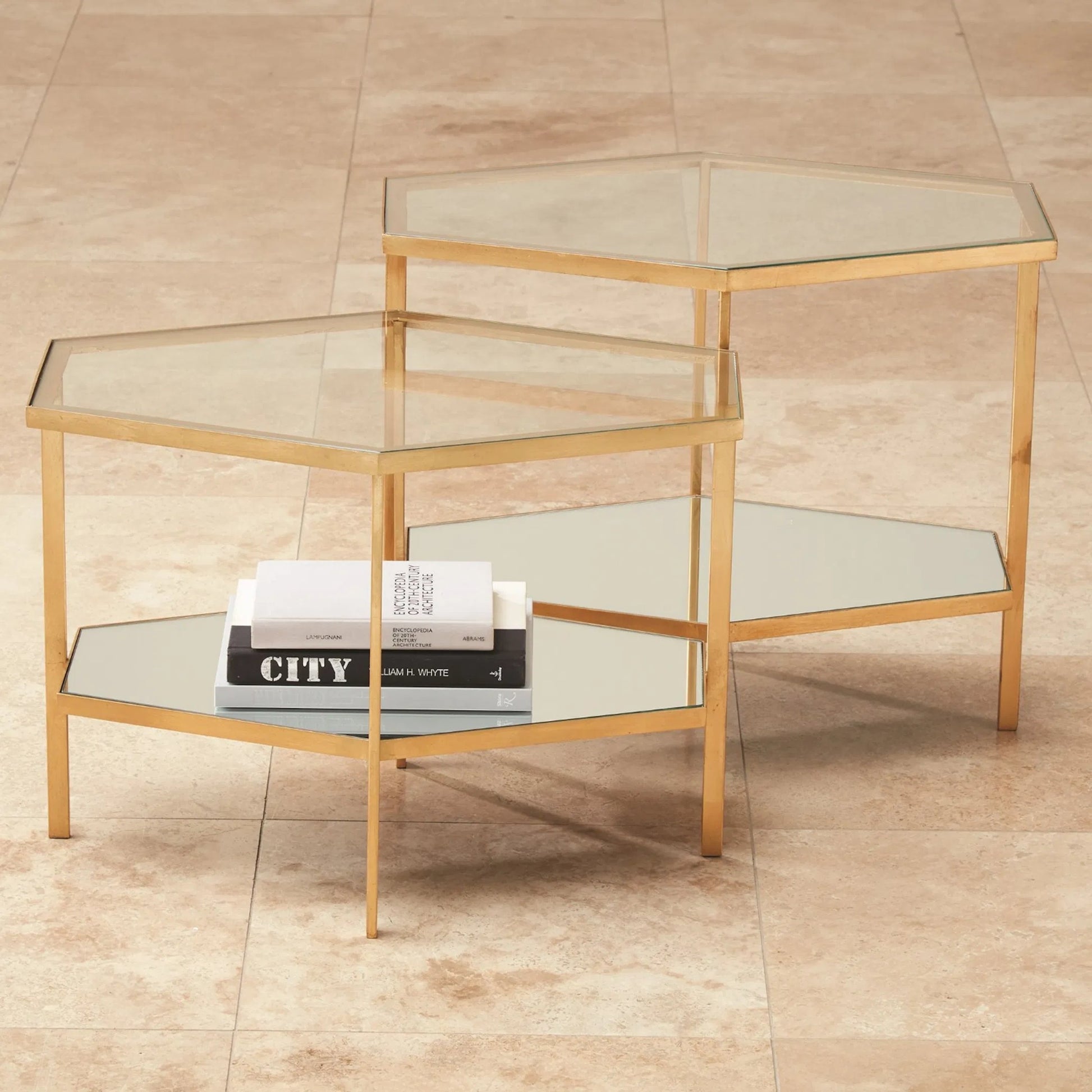 Hexagon Table by Global Views in gold leaf. Made from unique in a transitional style.