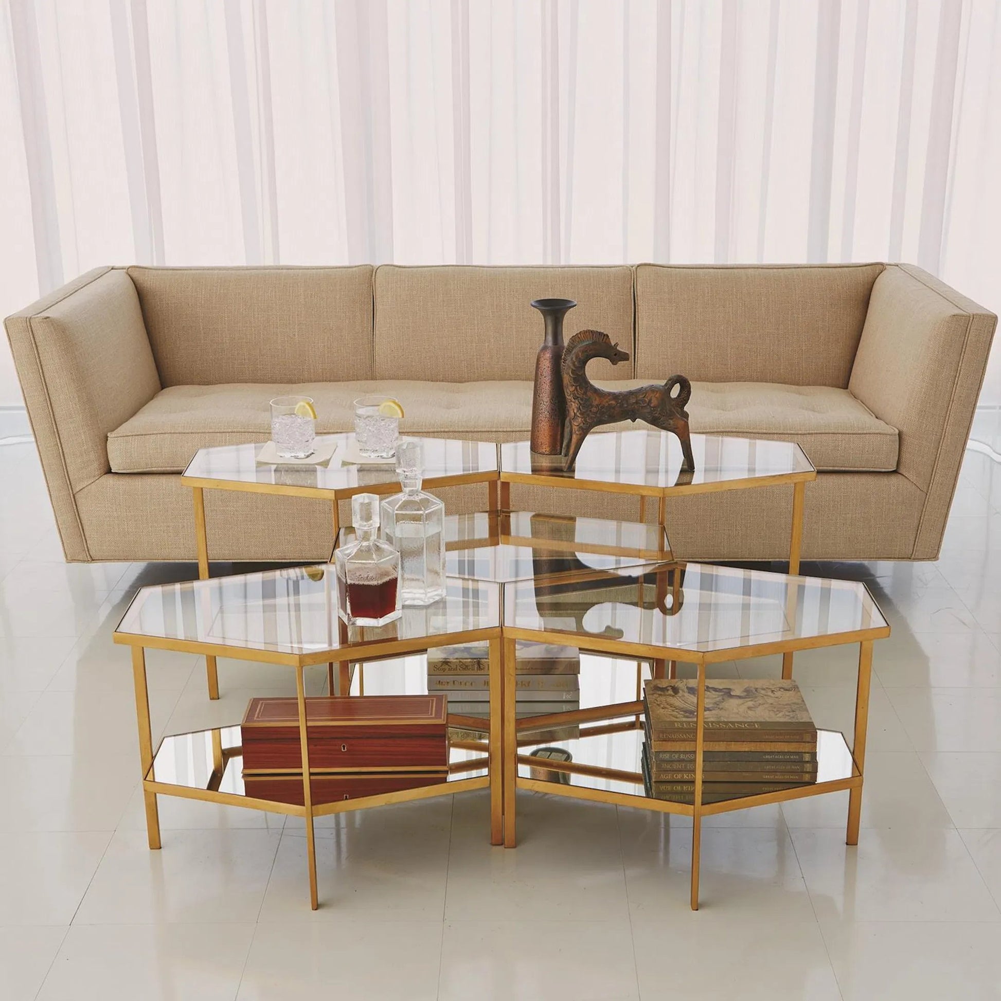 Hexagon Table by Global Views in gold leaf. Made from unique in a transitional style.