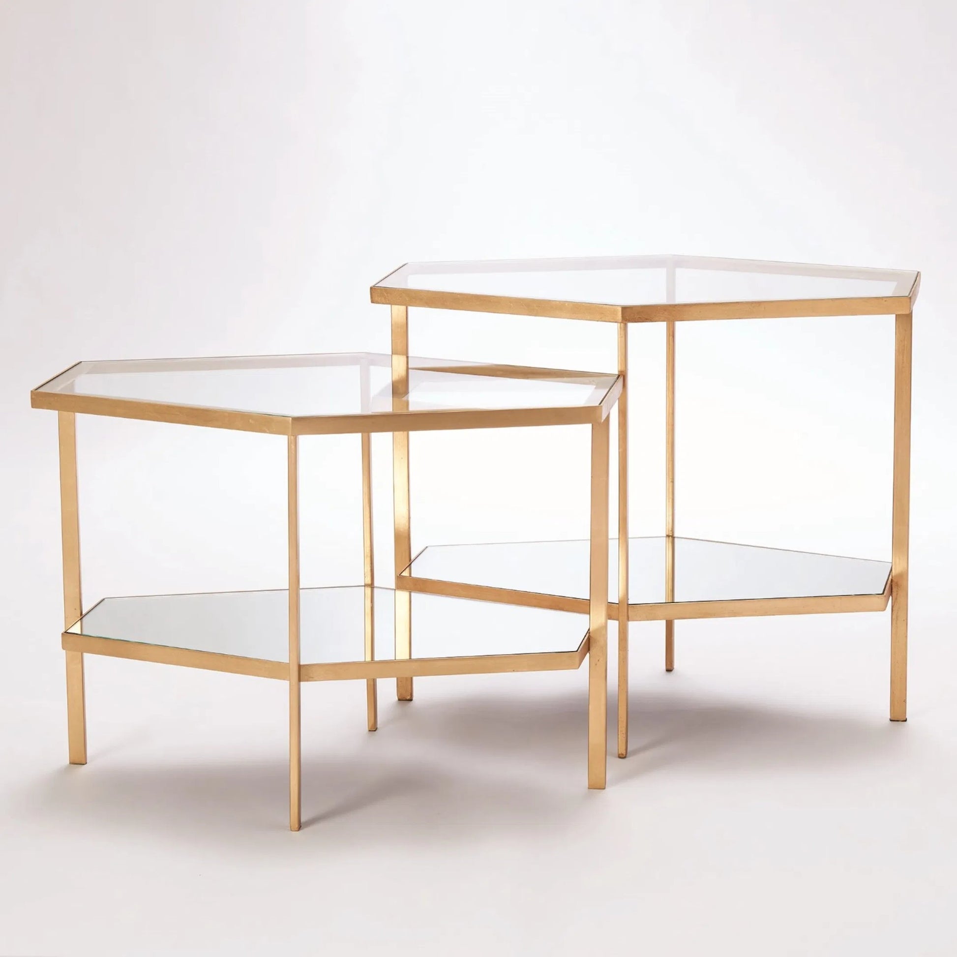 Hexagon Table by Global Views in gold leaf. Made from unique in a transitional style.