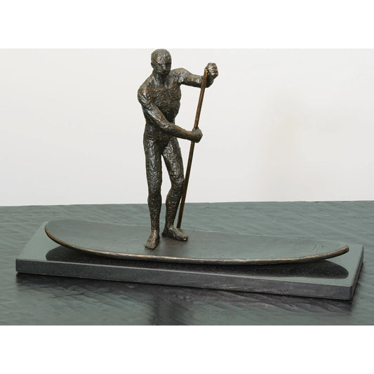 Sup Sculpture by Global Views in bronze. Made from iron, marble in a coastal style.