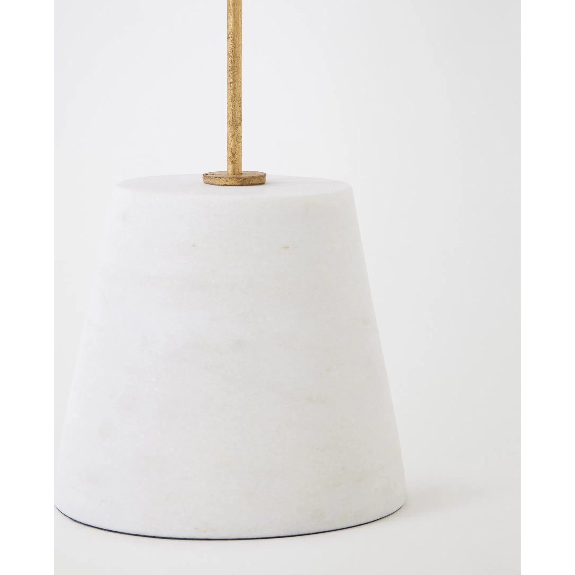 Shells on Marble by Global Views in miter, brass. Made from cast iron, white marble in a coastal style.