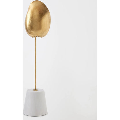 Shells on Marble by Global Views in miter, brass. Made from cast iron, white marble in a coastal style.
