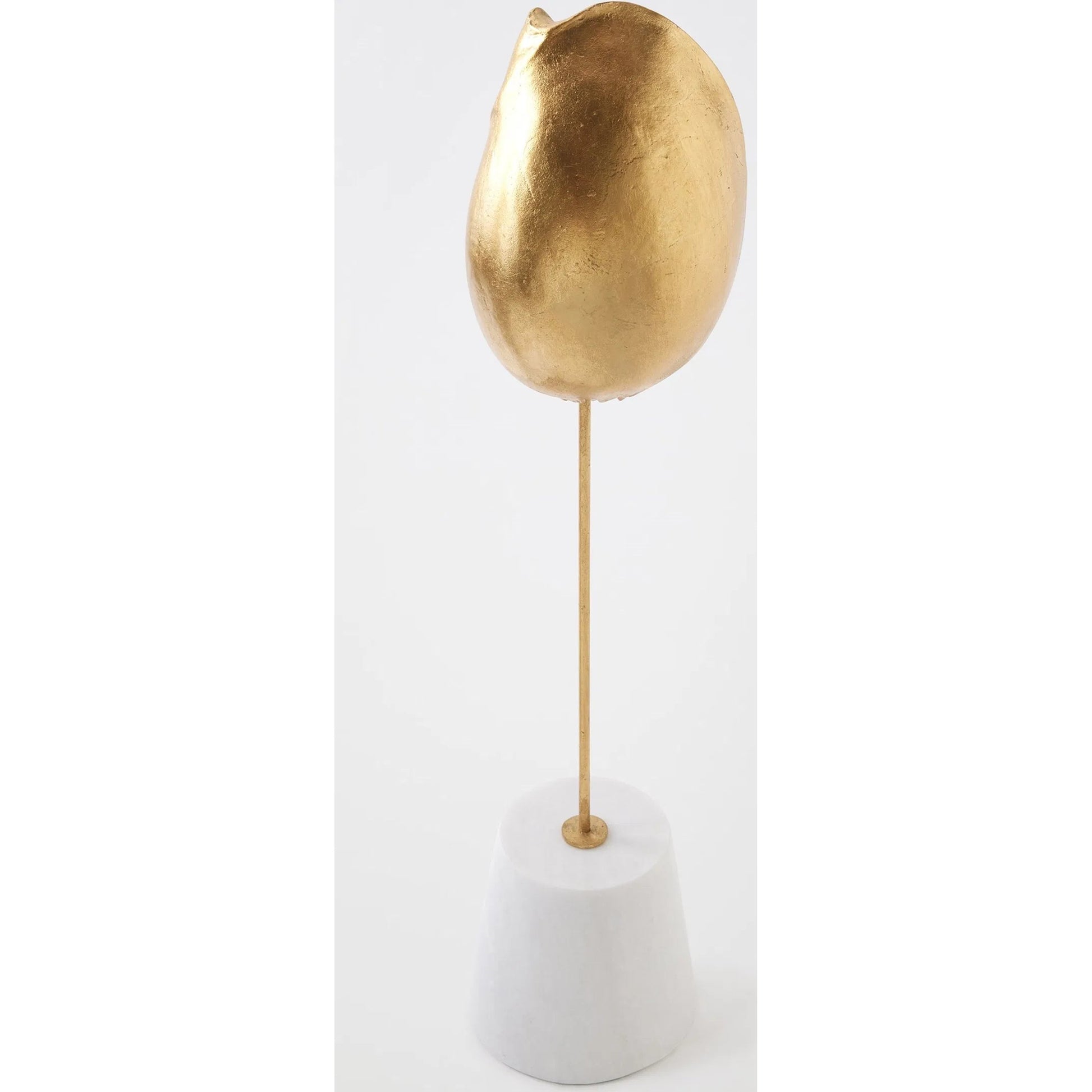 Shells on Marble by Global Views in miter, brass. Made from cast iron, white marble in a coastal style.