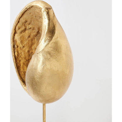 Shells on Marble by Global Views in miter, brass. Made from cast iron, white marble in a coastal style.
