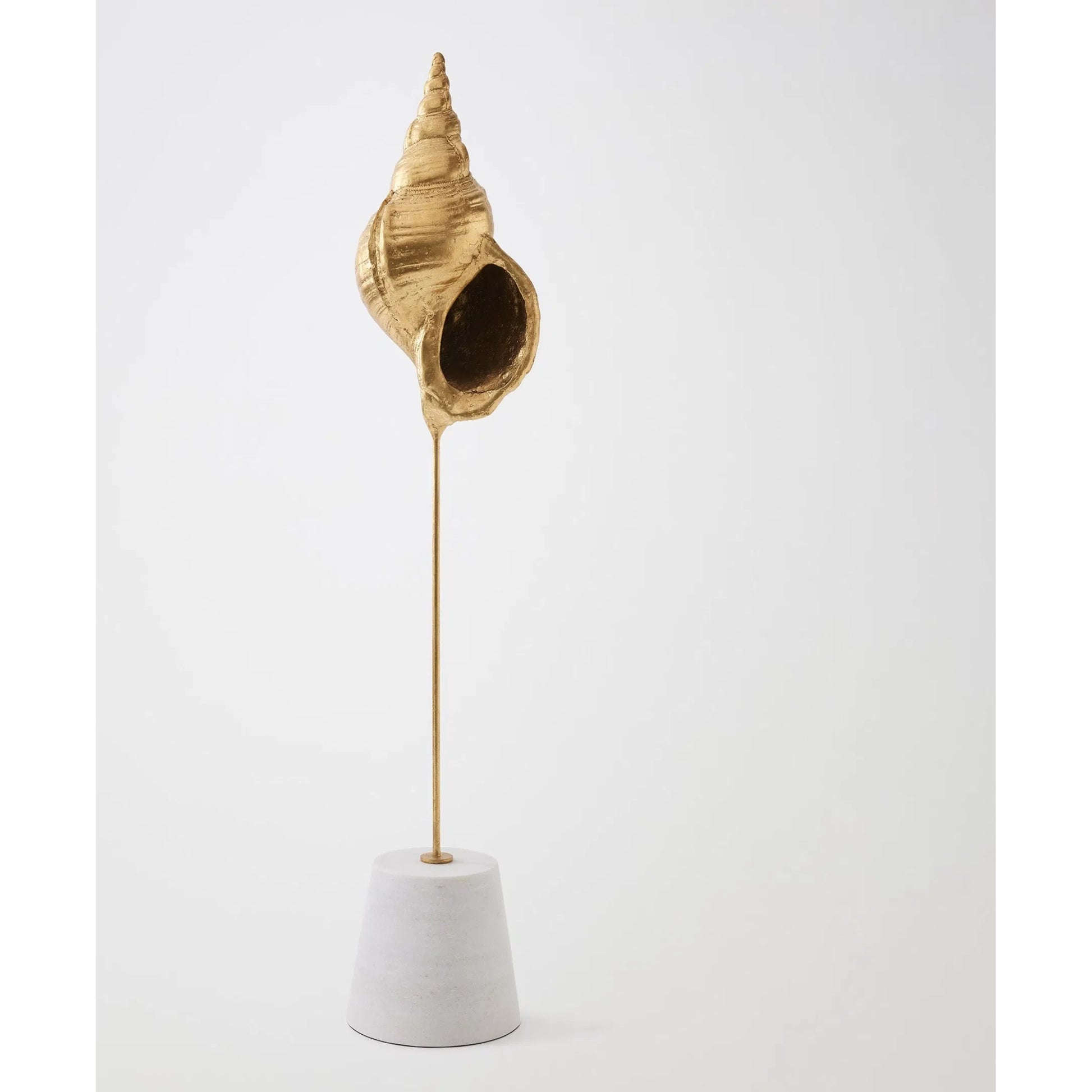 Shells on Marble by Global Views in miter, brass. Made from cast iron, white marble in a coastal style.