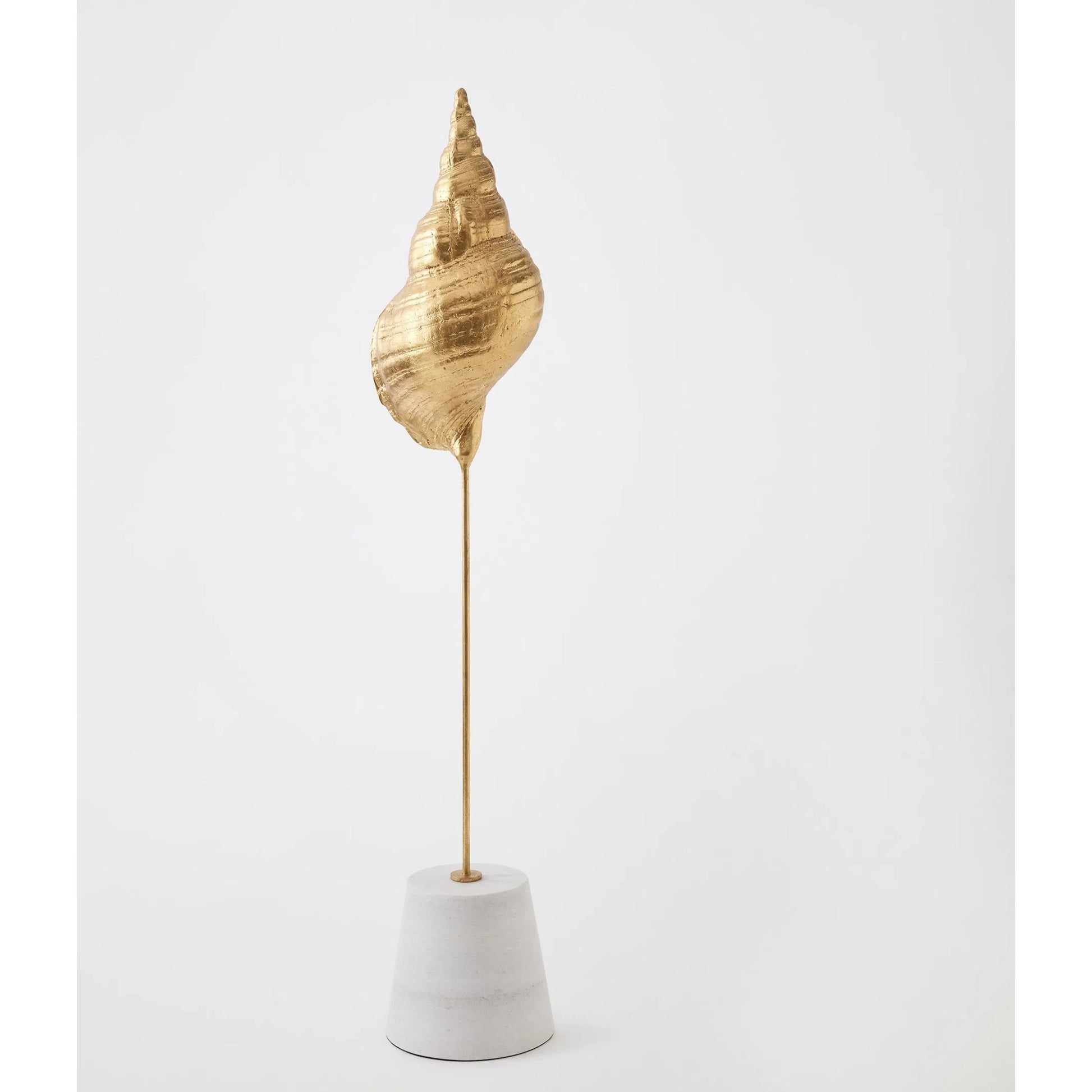 Shells on Marble by Global Views in miter, brass. Made from cast iron, white marble in a coastal style.