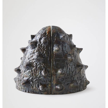 Biomorphic Bookends by Global Views in bronze, brass. Made from cast iron in a eclectic & global style.