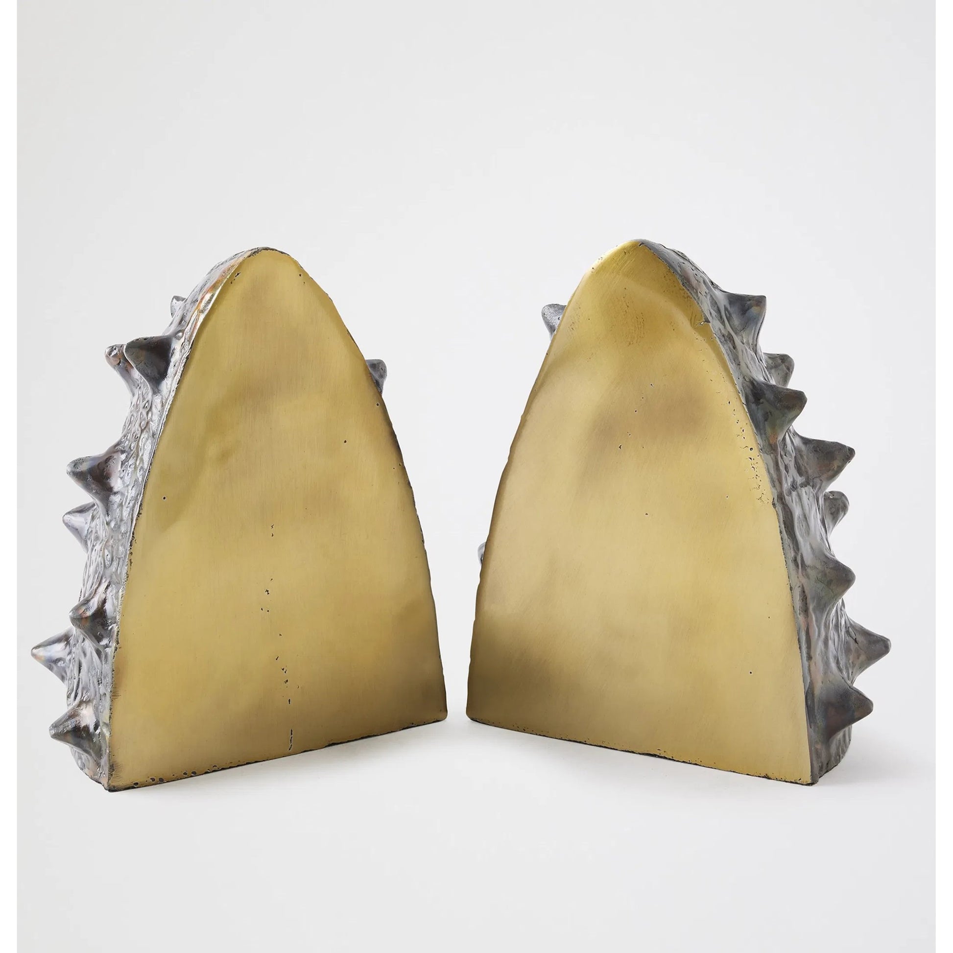 Biomorphic Bookends by Global Views in bronze, brass. Made from cast iron in a eclectic & global style.