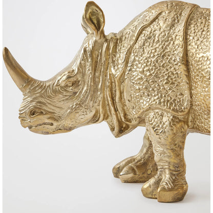 Rhino Sculpture by Global Views in brass. Made from cast brass in a modern style.