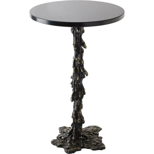Melting Side Table by Global Views in black. Made from cast iron, granite in a rustic style.
