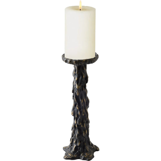 Melting Pillar Candle Holder by Global Views in black. Made from cast iron in a rustic style.