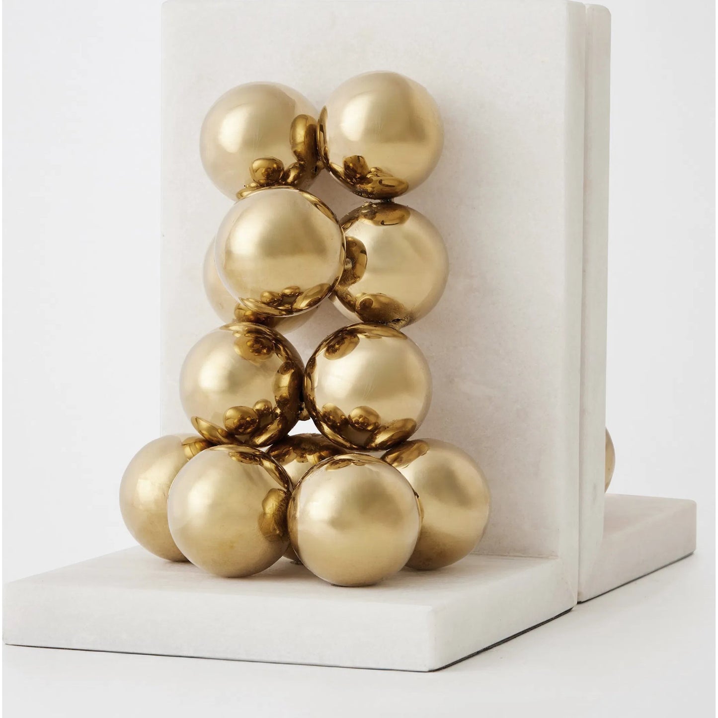 002 SI-2523887 | Closeup | Sphere Bookends by Global Views in brass. Made from faux gold ball, white marble in a modern style.