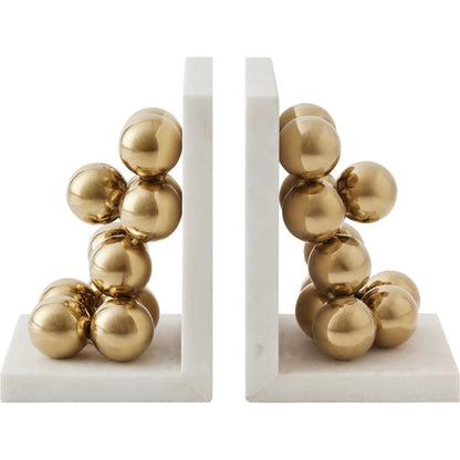Sphere Bookends by Global Views in brass. Made from faux gold ball, white marble in a modern style.