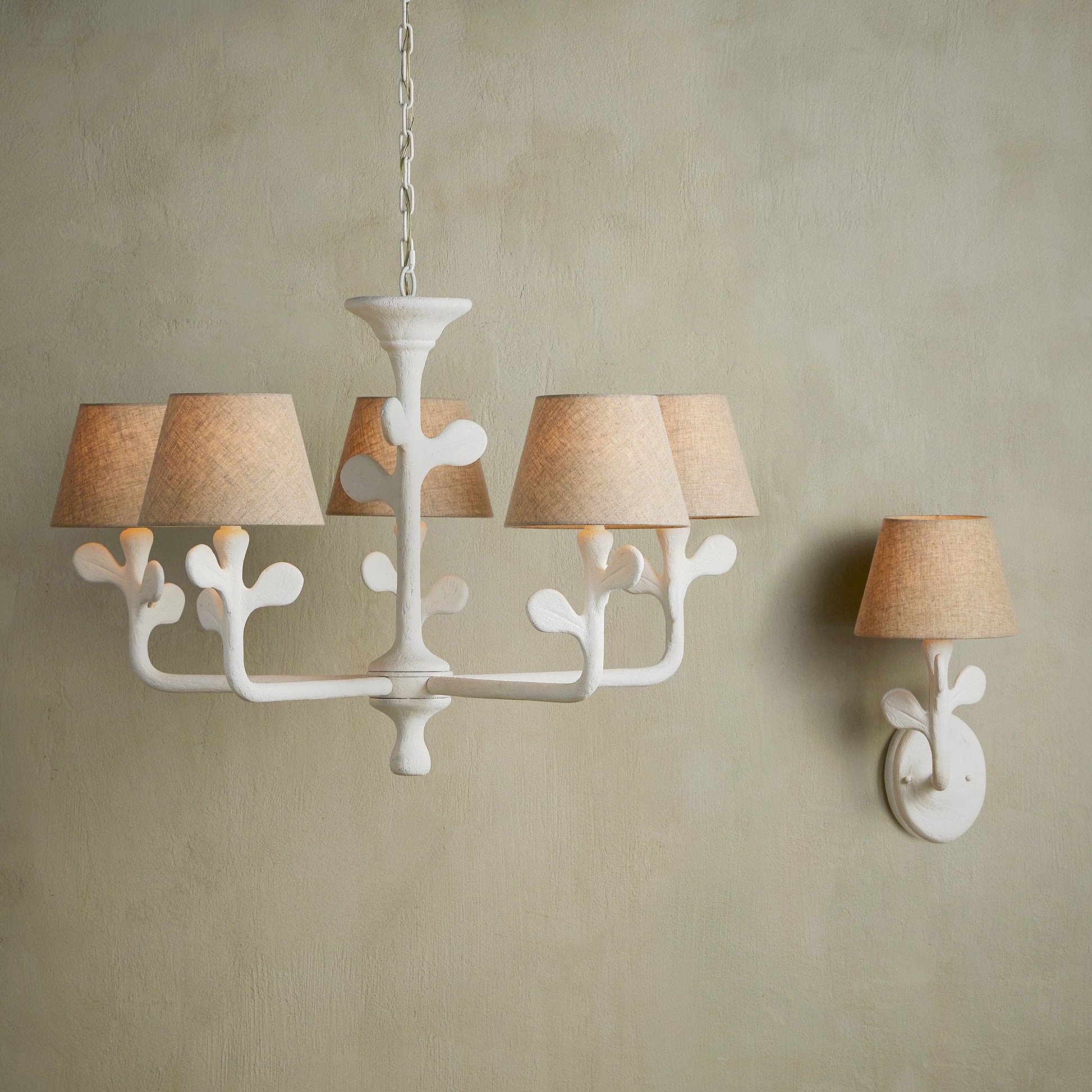 Charny Wall Sconce by Currey and Company in gesso white. Made from composite, metal in a modern style.