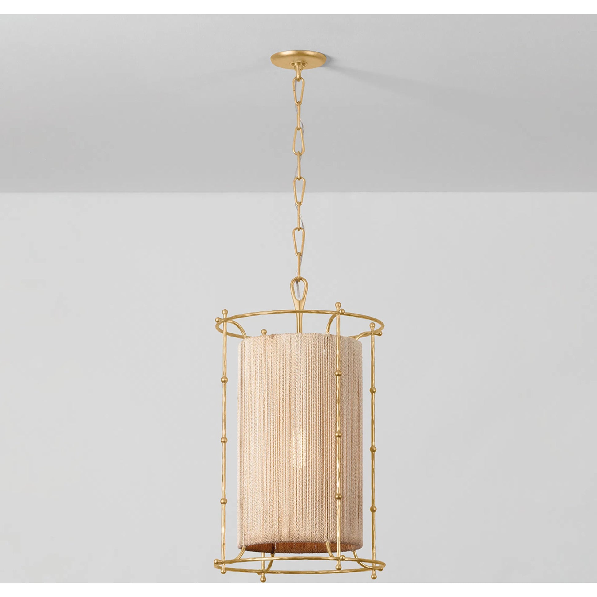 Jones Point Lantern by Hudson Valley in vintage gold leaf. Made from iron in a transitional style.