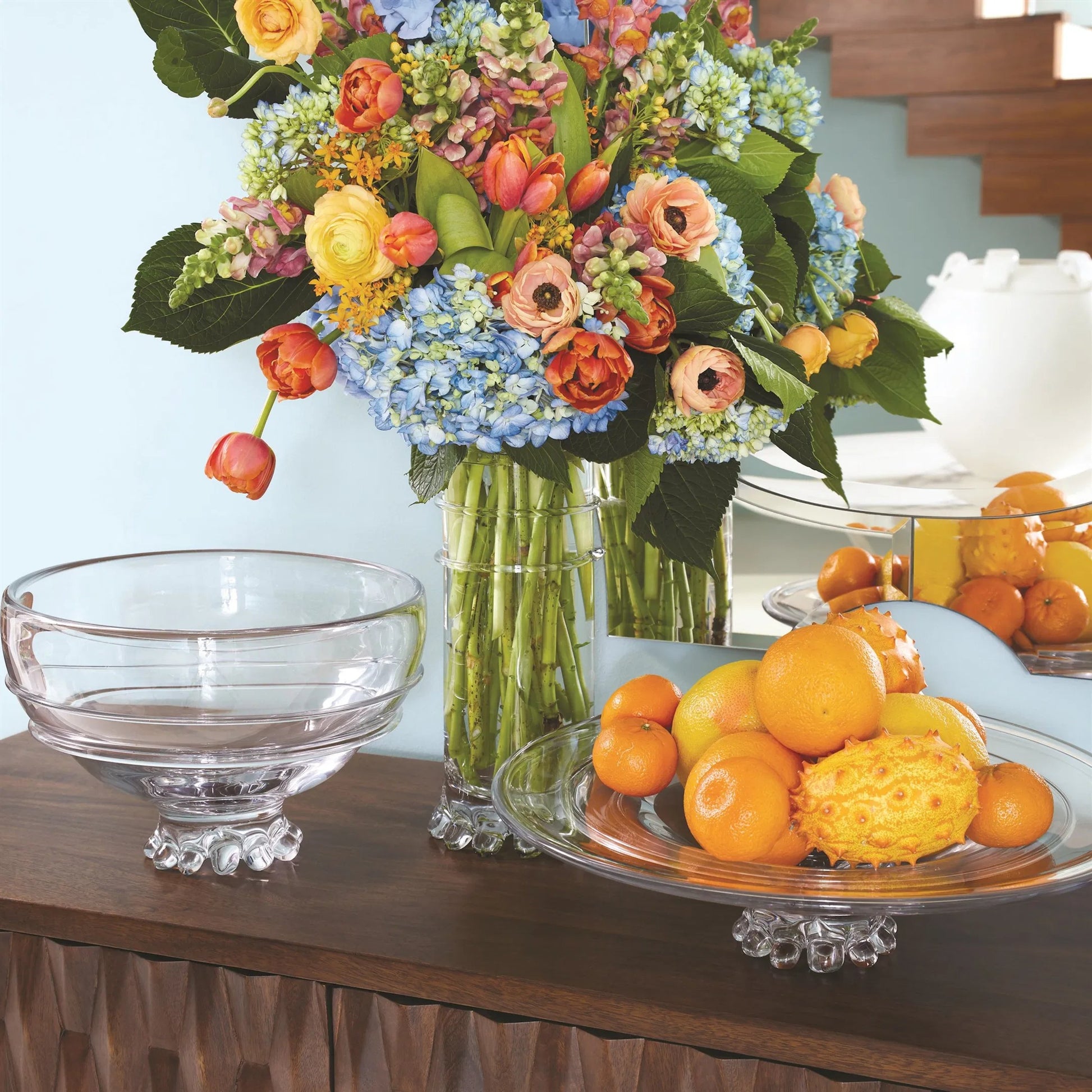 Verre Lisse Plate by Global Views. Made from glass in a transitional style.