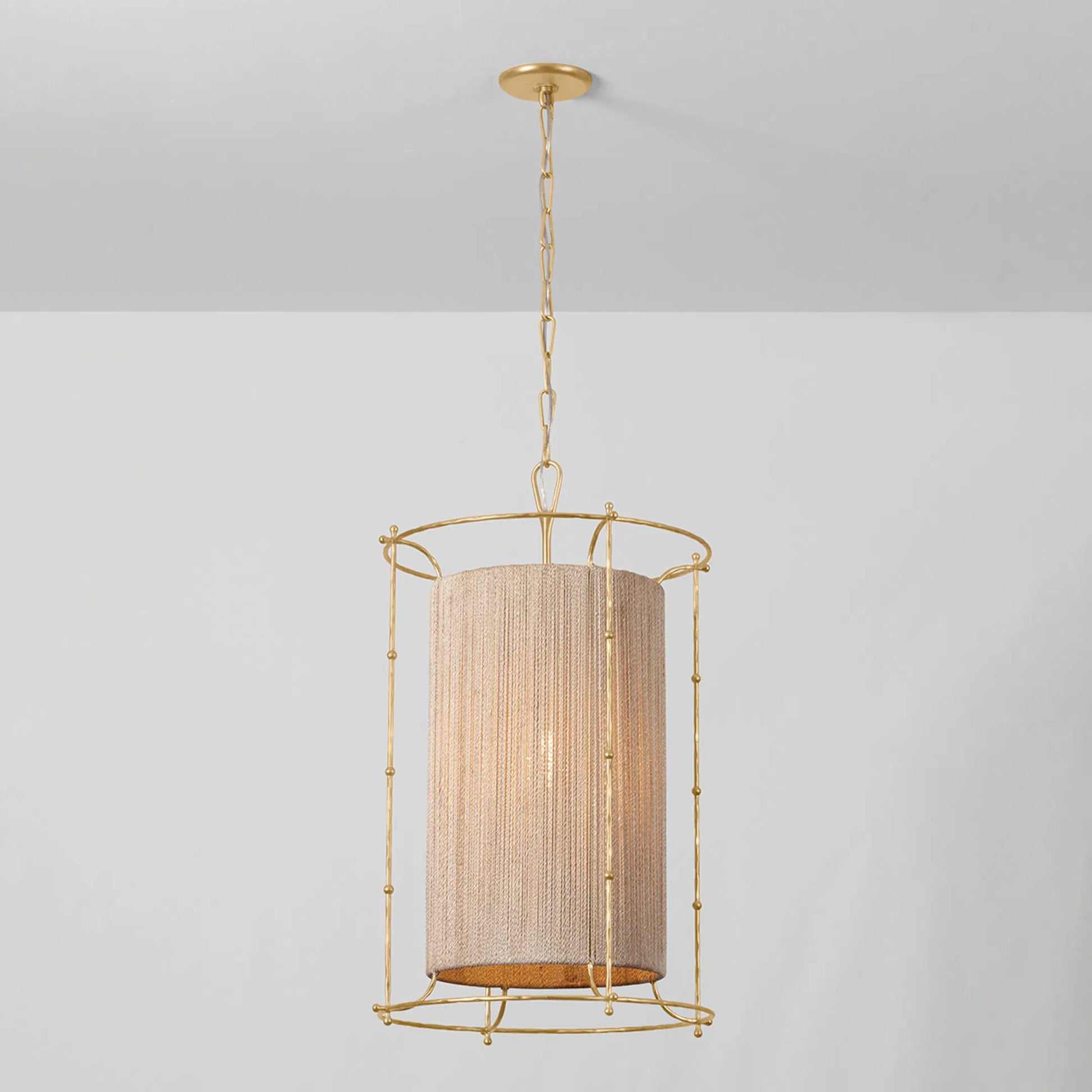 Jones Point Lantern by Hudson Valley in vintage gold leaf. Made from iron in a transitional style.