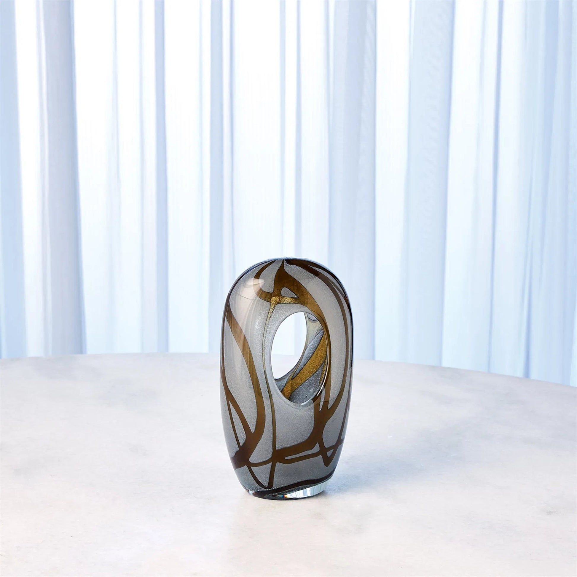 Swirl Vase by Global Views in amber, gray. Made from art glass in a modern style.