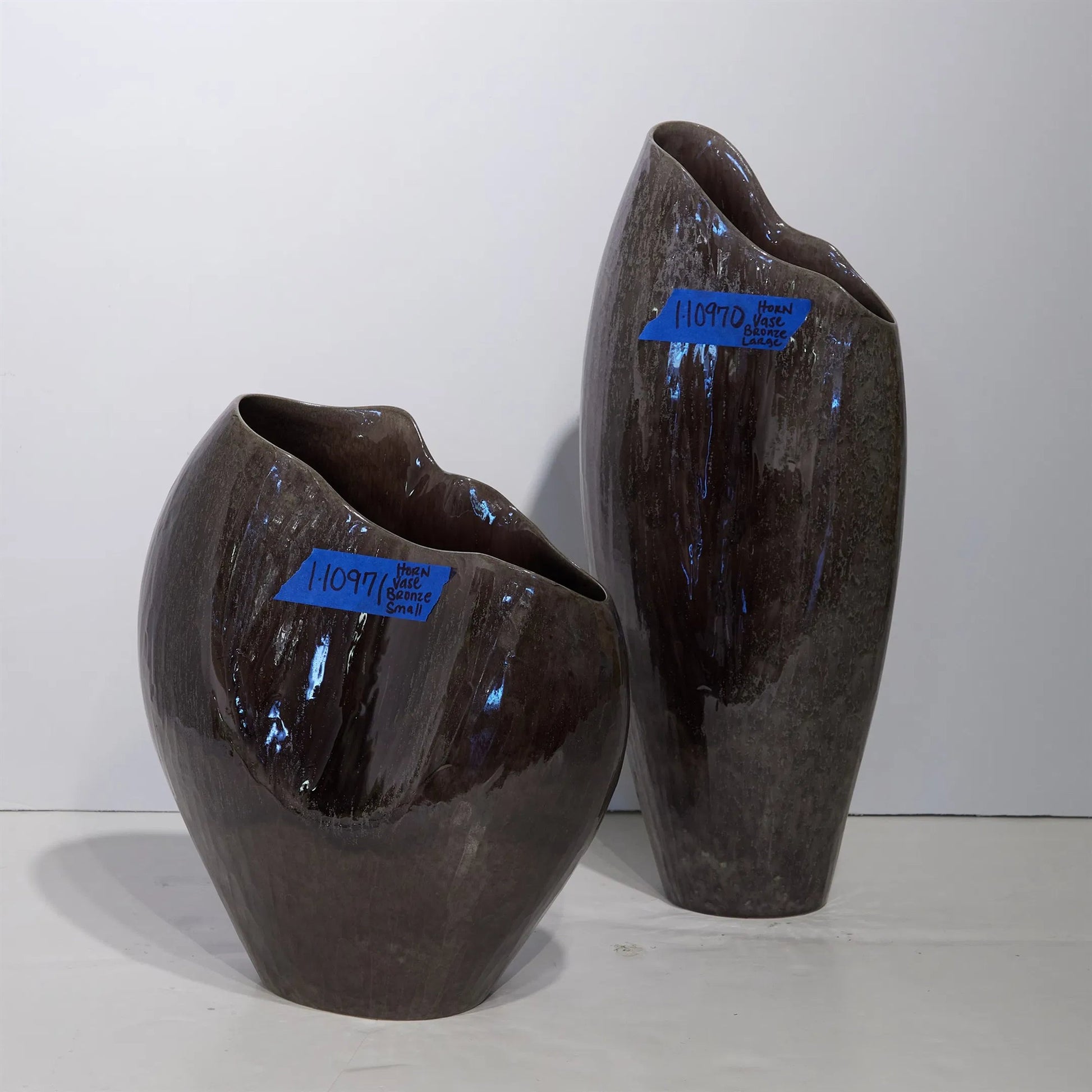 Horn Amethyst Vase by Global Views in amethyst. Made from unique in a modern style.