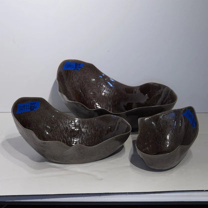 Horn Bowl, Reactive Amethyst by Global Views in reactive amethyst. Made from ceramic in a modern style.