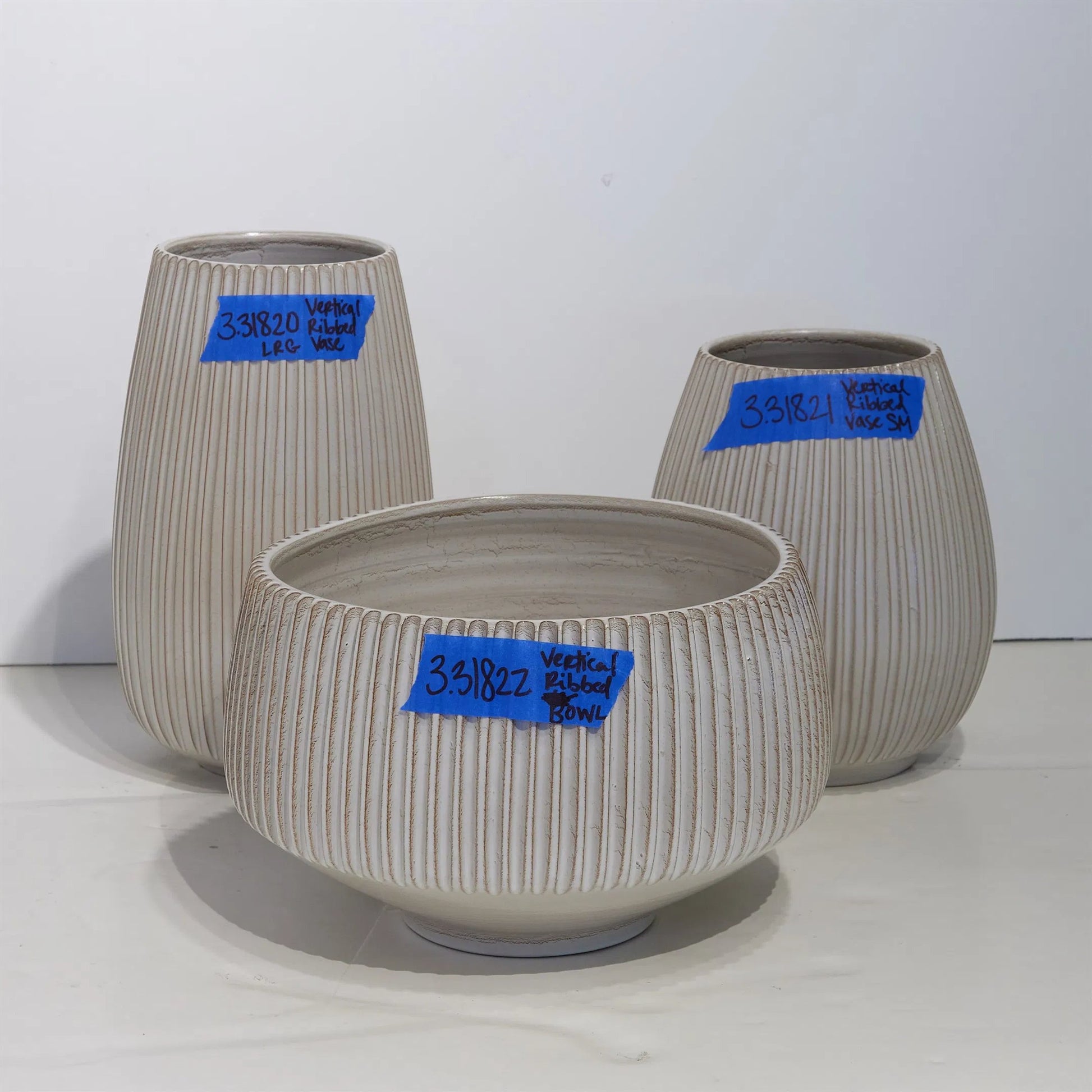 Vertical Ribbed Bowl by Global Views in natural. Made from ceramic in a unique style.