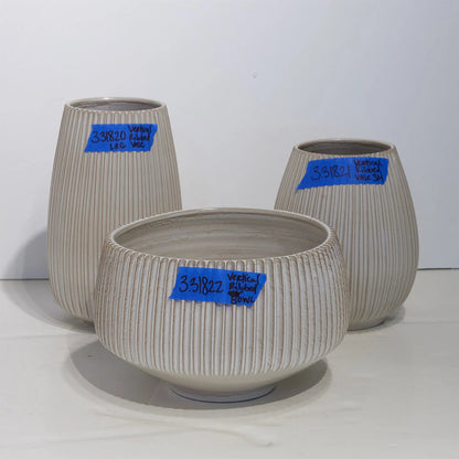 Vertical Ribbed Bowl by Global Views in natural. Made from ceramic in a unique style.