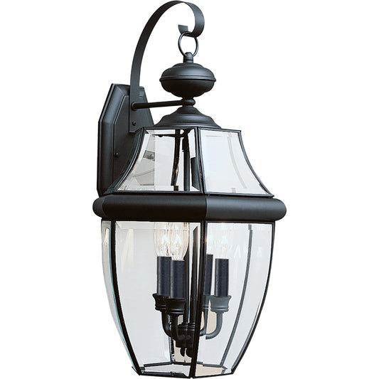 Lancaster Three Light Outdoor Wall Lantern by Visual Comfort & Co.. Made from brass in a unique style.