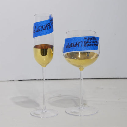 Metallic Orb Champagne Flute by Global Views. Made from art glass in a eclectic & global style.