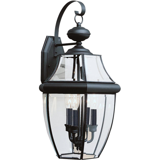 Lancaster Three Light Outdoor Wall Lantern by Visual Comfort & Co.. Made from brass in a unique style.