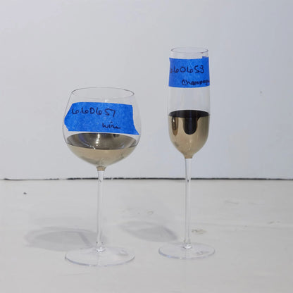 Metallic Orb Champagne Flute by Global Views. Made from art glass in a eclectic & global style.