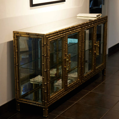 Bamboo Console by Global Views in brass. Made from unique in a rustic style.