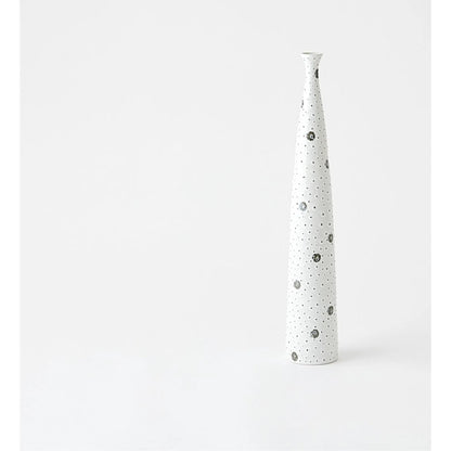 Spotted Tapered Vase by Global Views in white and black. Made from unique in a eclectic & global style.