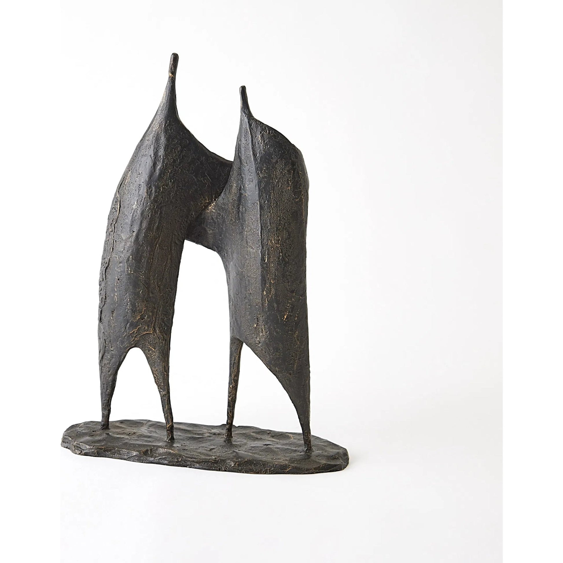 Buddies Sculpture by Global Views. Made from cast iron in a modern style.