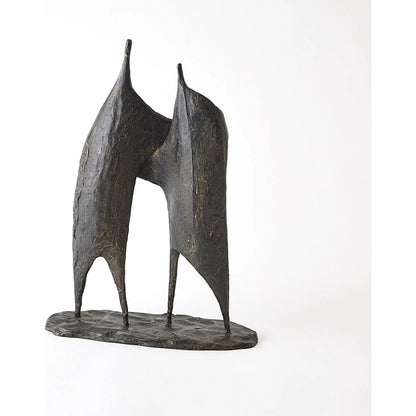 Buddies Sculpture by Global Views. Made from cast iron in a modern style.