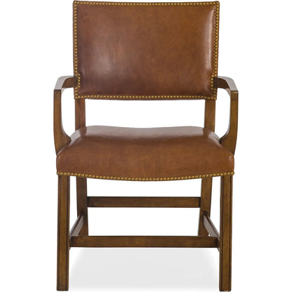 Rudy Arm Chair by Maitland-Smith in dark walnut. Made from leather upholstery in a unique style.