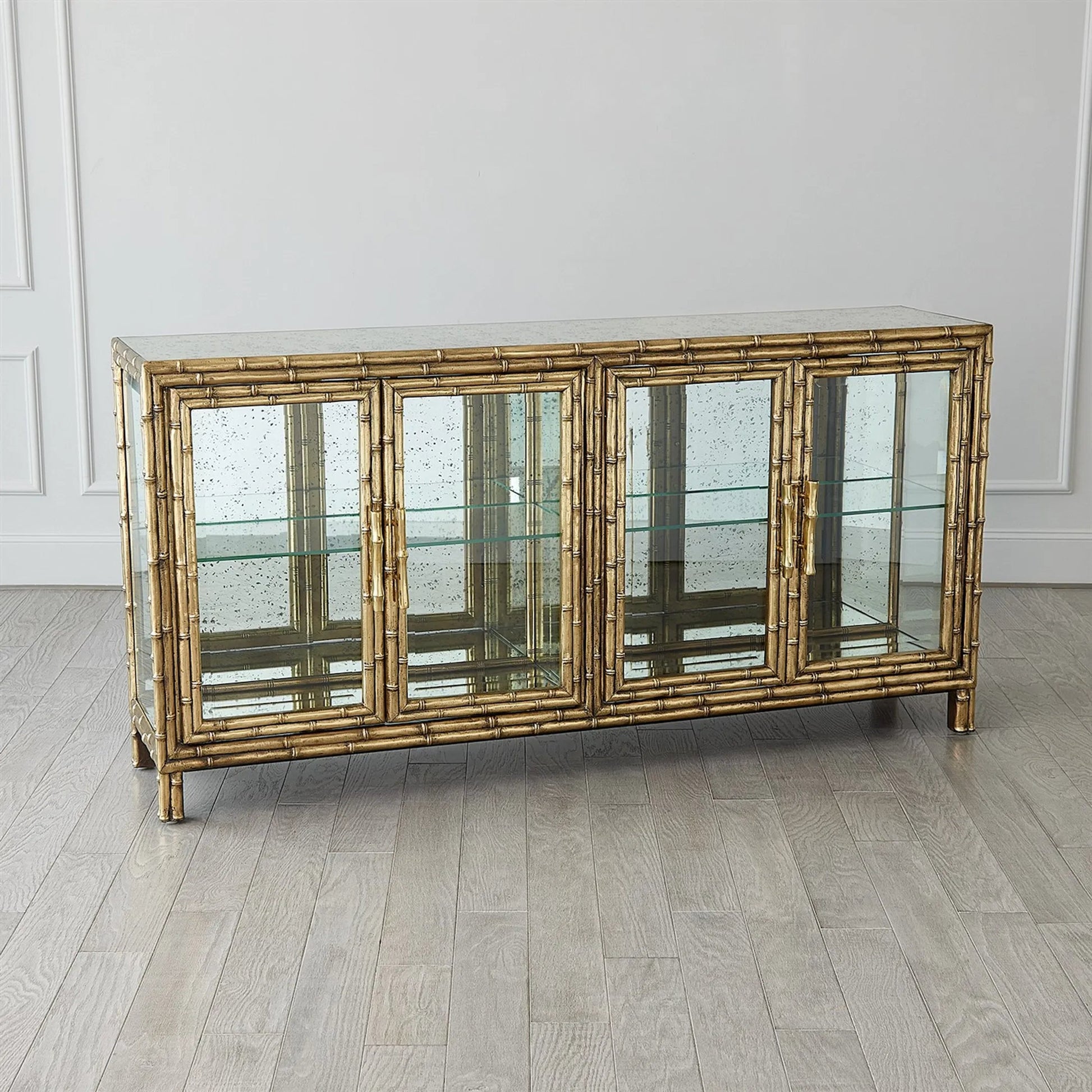 Bamboo Console by Global Views in brass. Made from unique in a rustic style.